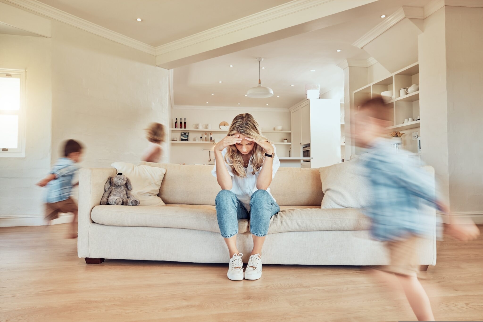 Headache,,Mother,And,Children,Running,In,Living,Room,,Problem,And