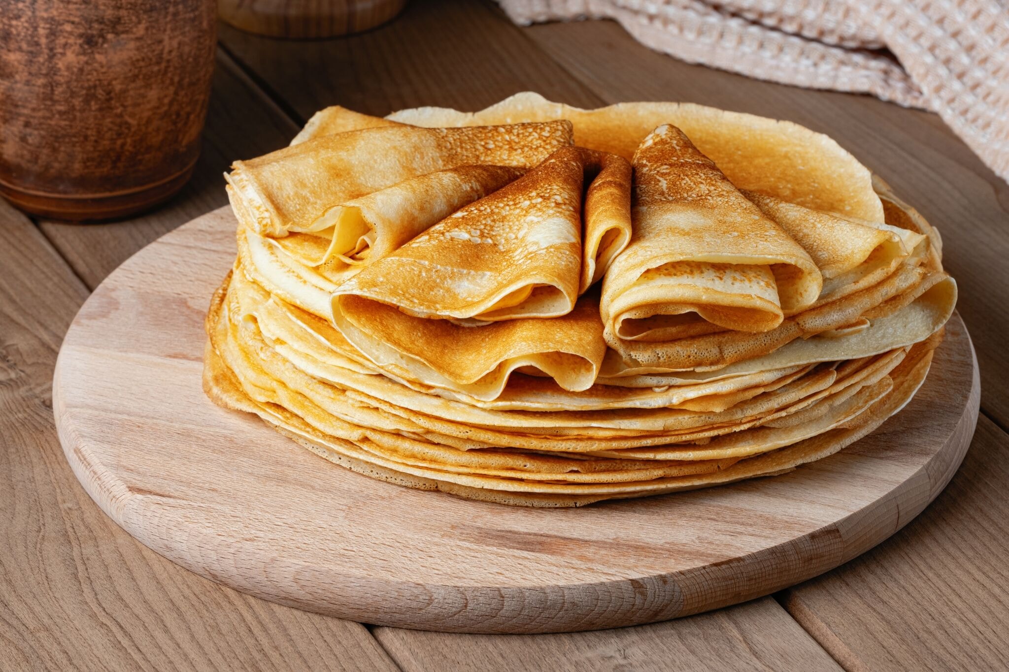 Thin,Pancakes,On,A,Wood,Plate.,Homemade,Crepes,,Tasty,Food.
