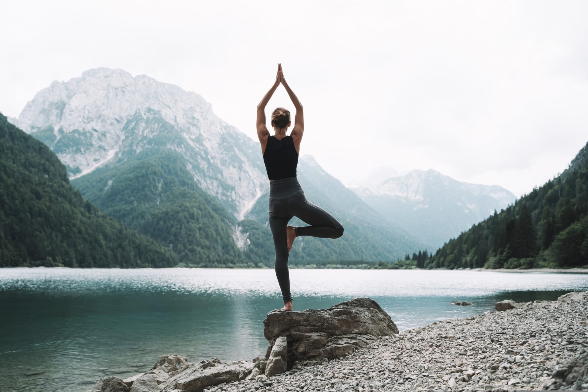 Young,Woman,Is,Practicing,Yoga,At,Mountain,Lake.,Girl,Doing