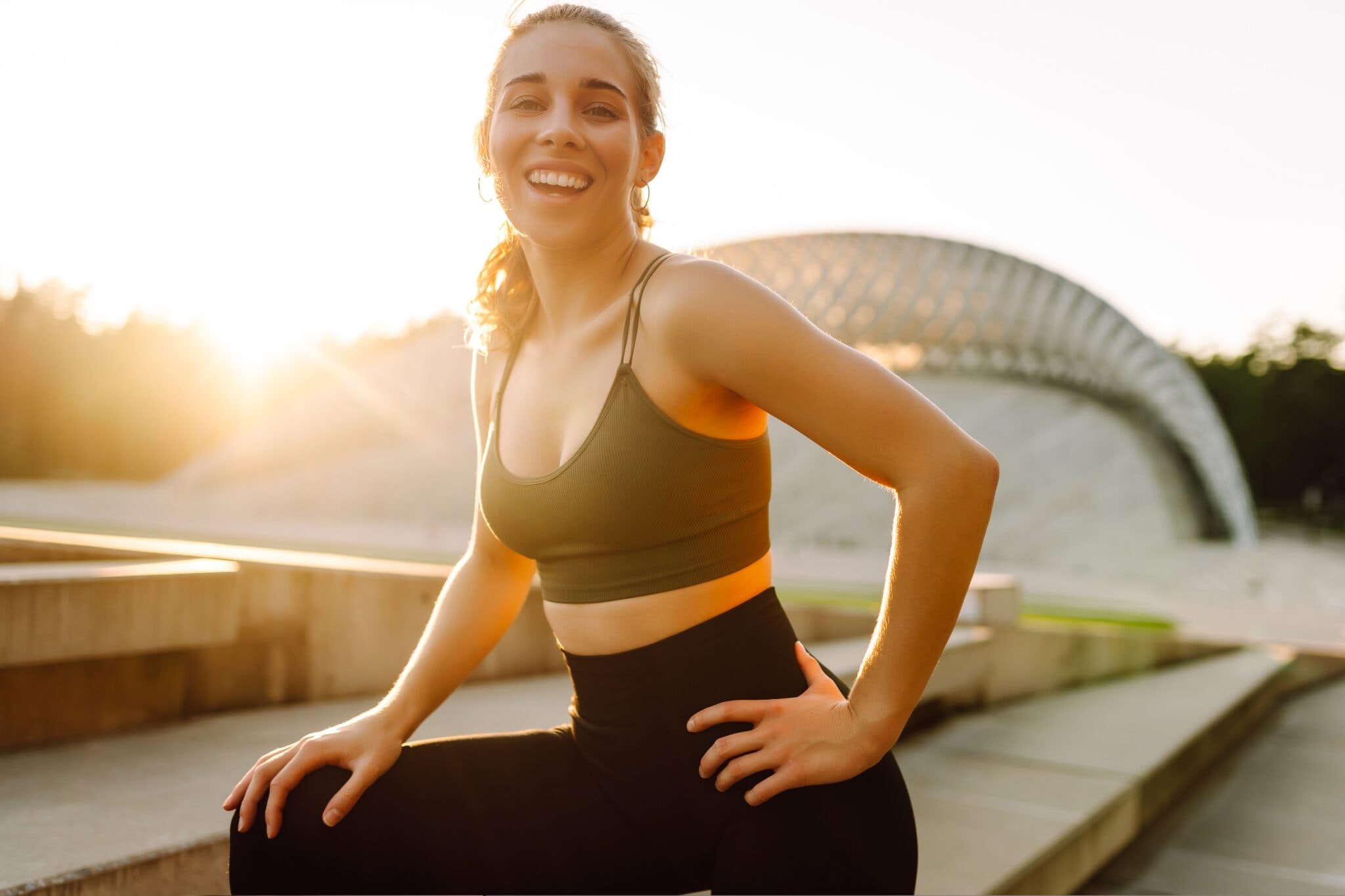 Sporty,Woman,Doing,Exercises,At,Sunset.,Beautiful,Woman,In,Sportswear