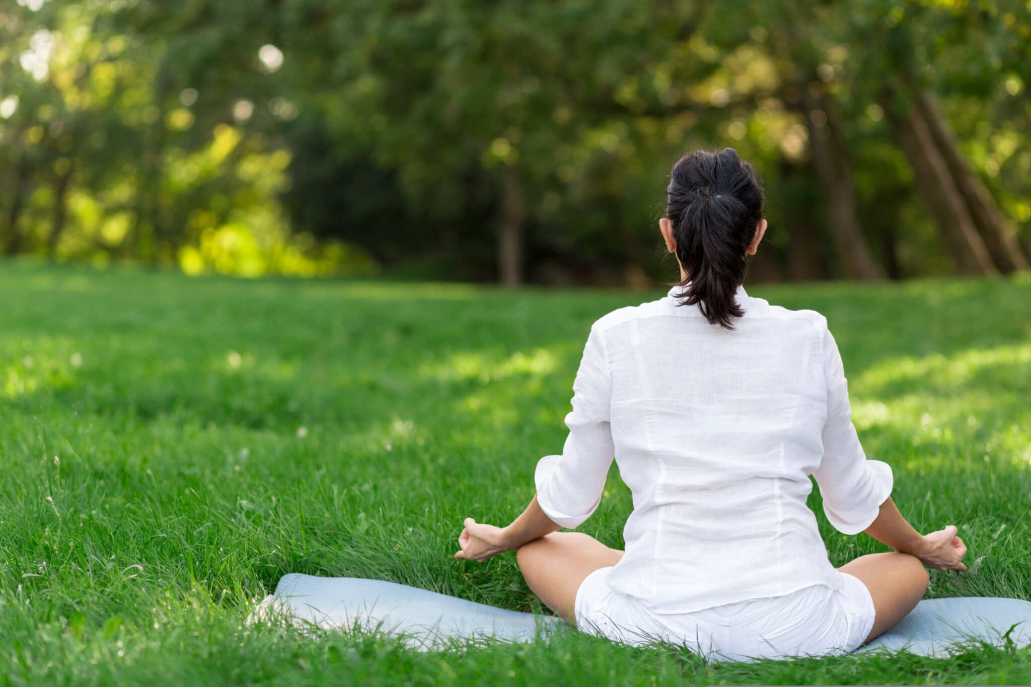 Middle,Aged,Woman,Doing,Yoga,Early,In,The,Morning,In