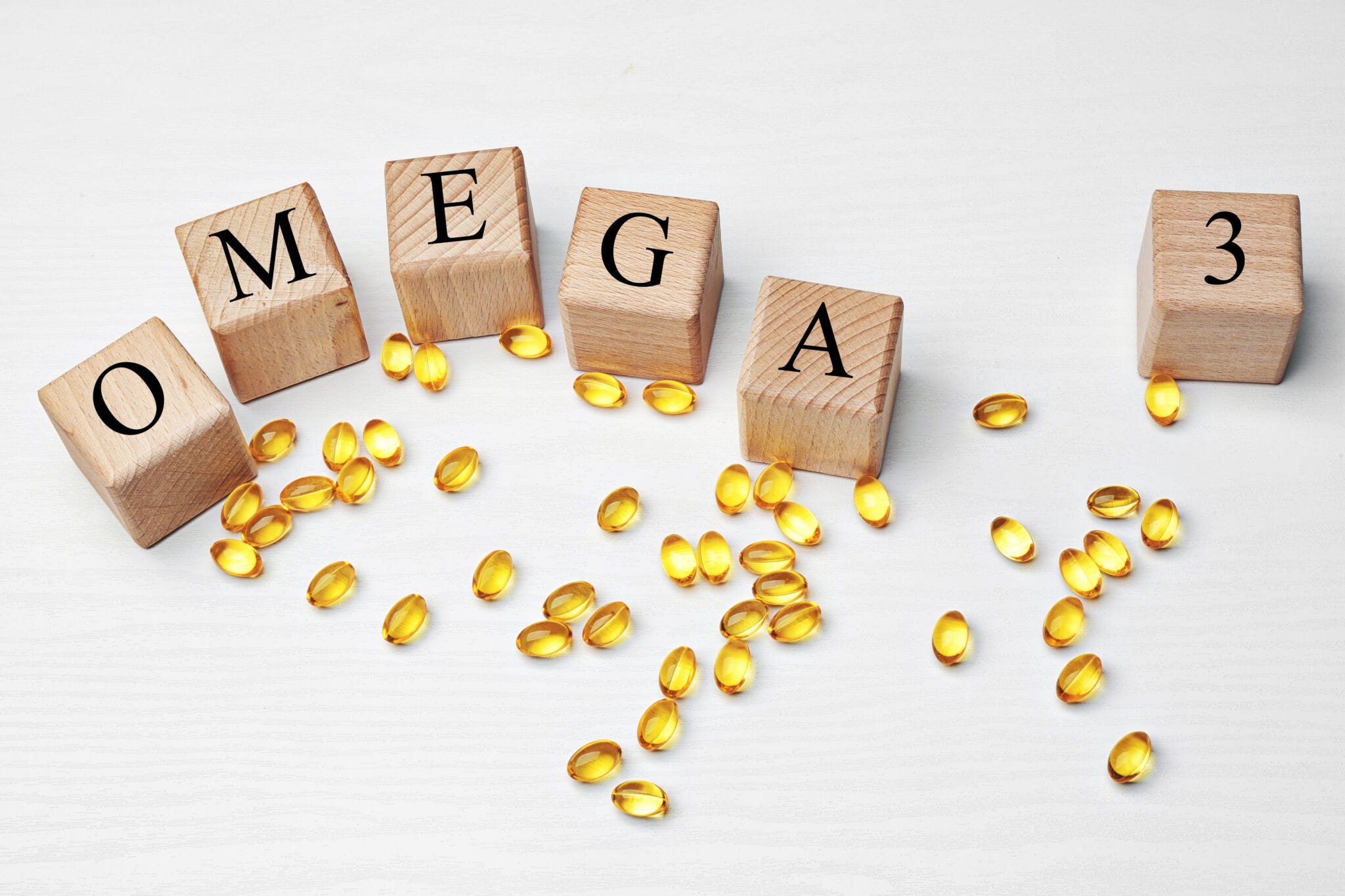 Fish,Oil,Pills,And,Wooden,Cubes,With,Inscription,Omega,3